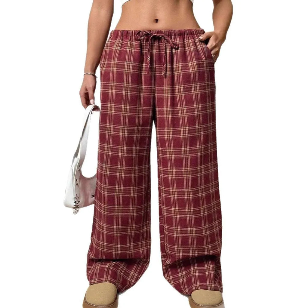 Women's loose-fit plaid trousers with drawstring waist and side pockets in blue or red