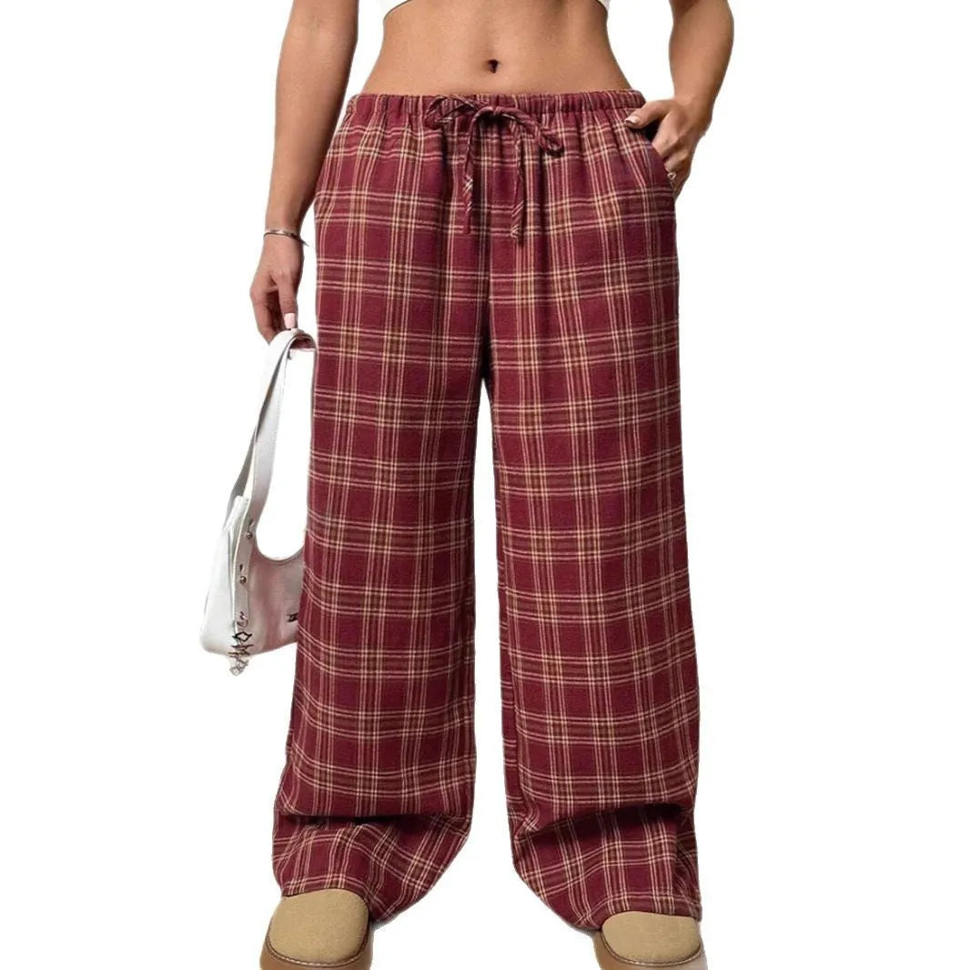 Women's loose-fit plaid trousers with drawstring waist and side pockets in blue or red
