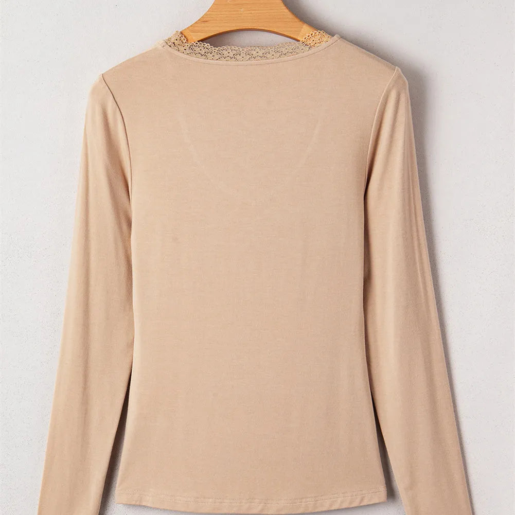 Women's red slim-fit long-sleeved top with lace trim on a solid colour background.
