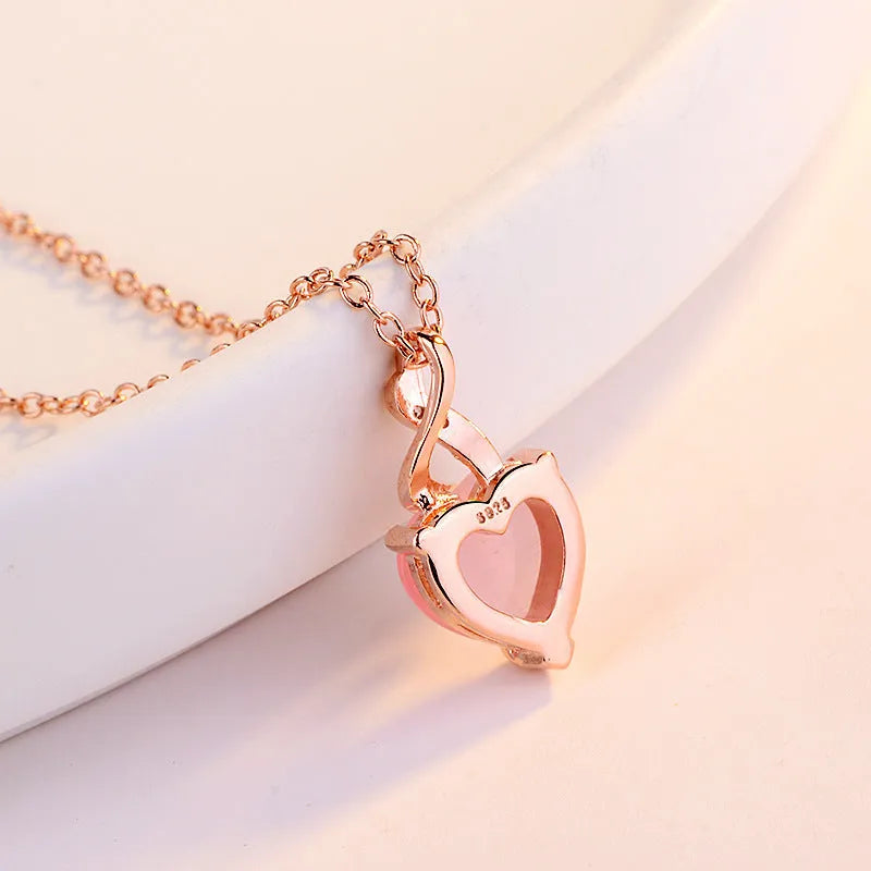 Rose gold heart-shaped crystal pendant necklace with cross chain for women