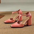 Women's dark brown retro Mary Jane shoes with a pointed toe, hollow Baotou detail, and buckle fastening.