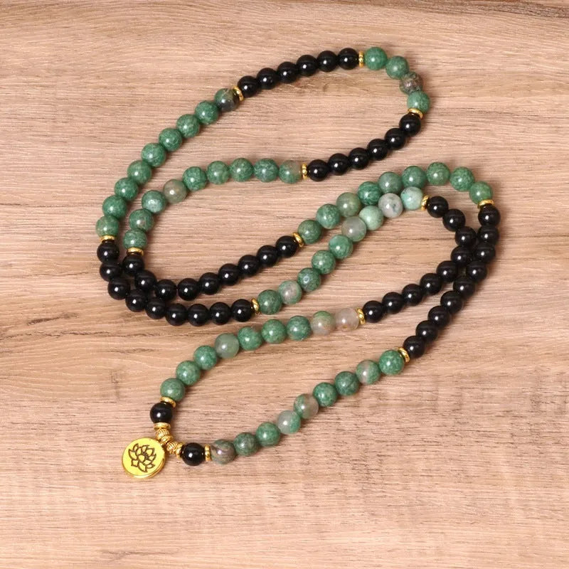 Green and black elastic beaded long bracelet with alloy beads on stretch band