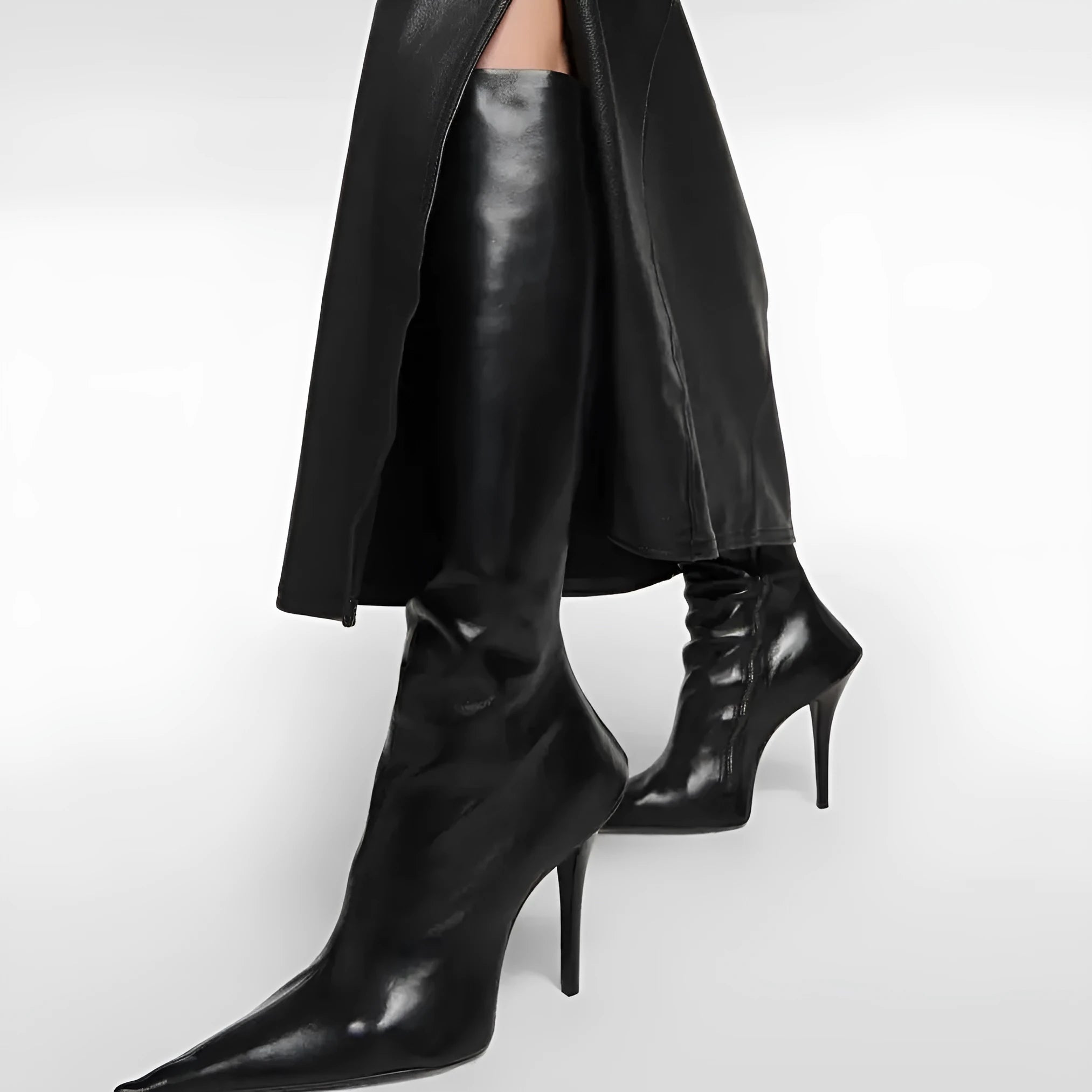 Black women's stiletto heel pointed toe knee-high boots with side zipper