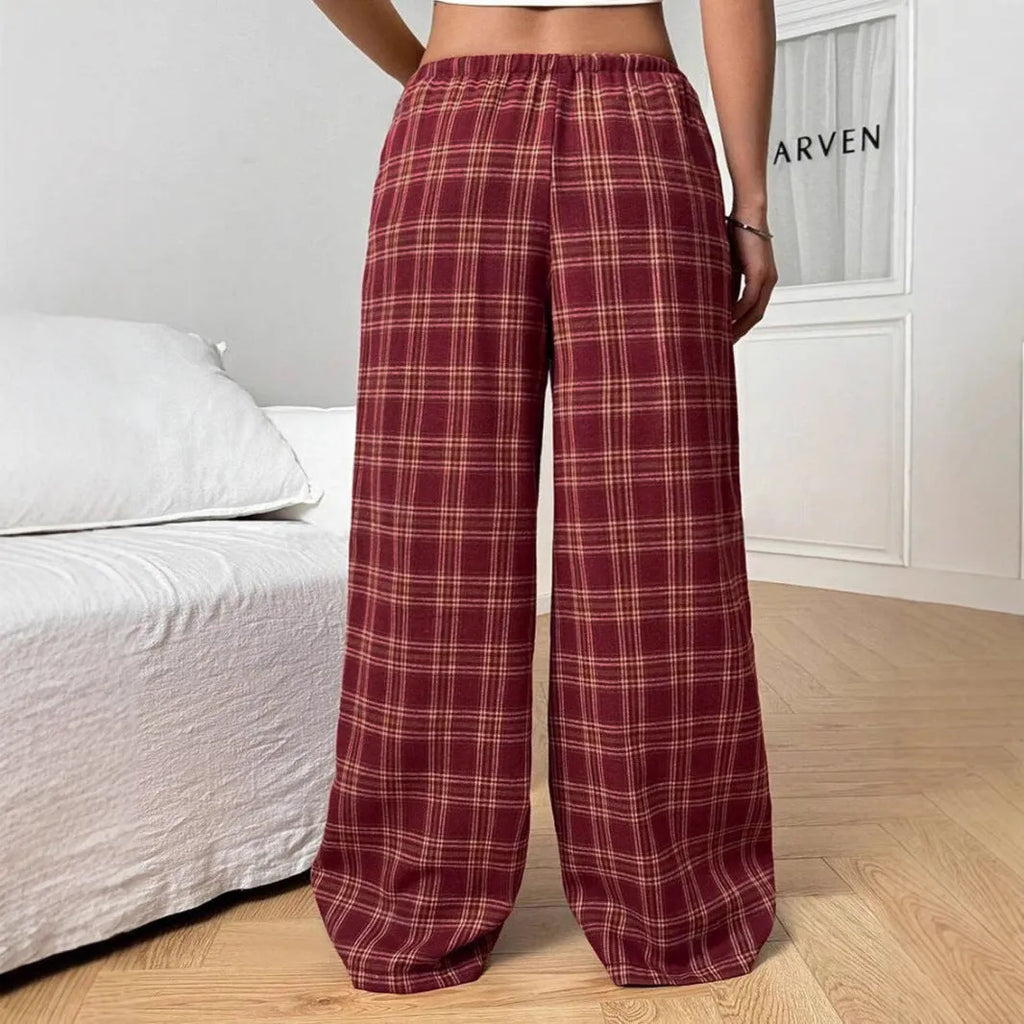 Women's loose-fit plaid trousers with drawstring waist and side pockets in blue or red