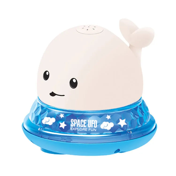 Electric whale bath toy with automatic water spray and flashing lights on a base