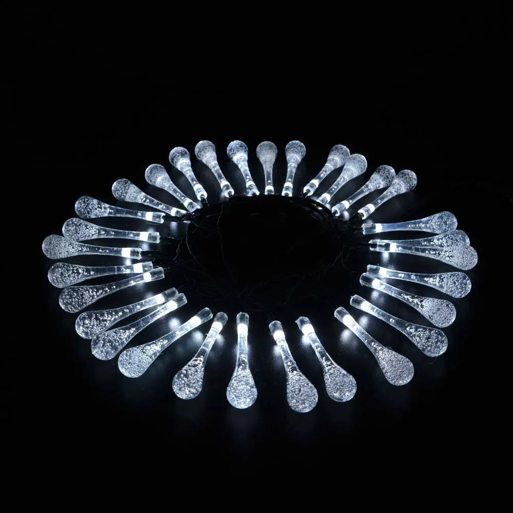 Solar-powered LED outdoor string lights with water drop pendants on a 6.5 metre cable
