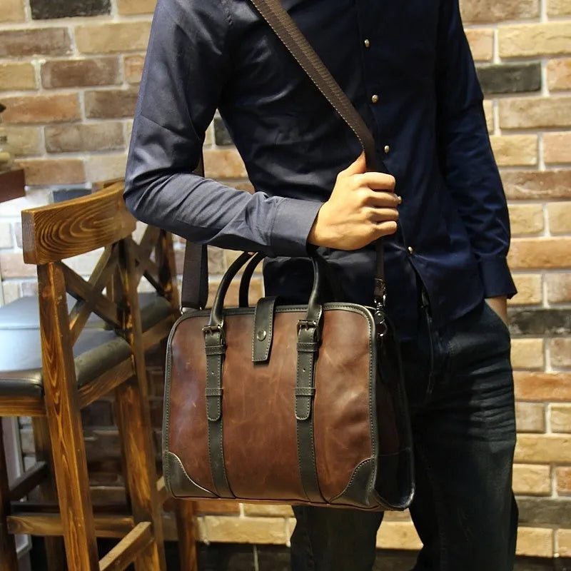Men's cowhide leather handbag in black with zipper closure and hard handle