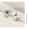 Women's flower stud earrings in electroplated alloy with pink or white colour options