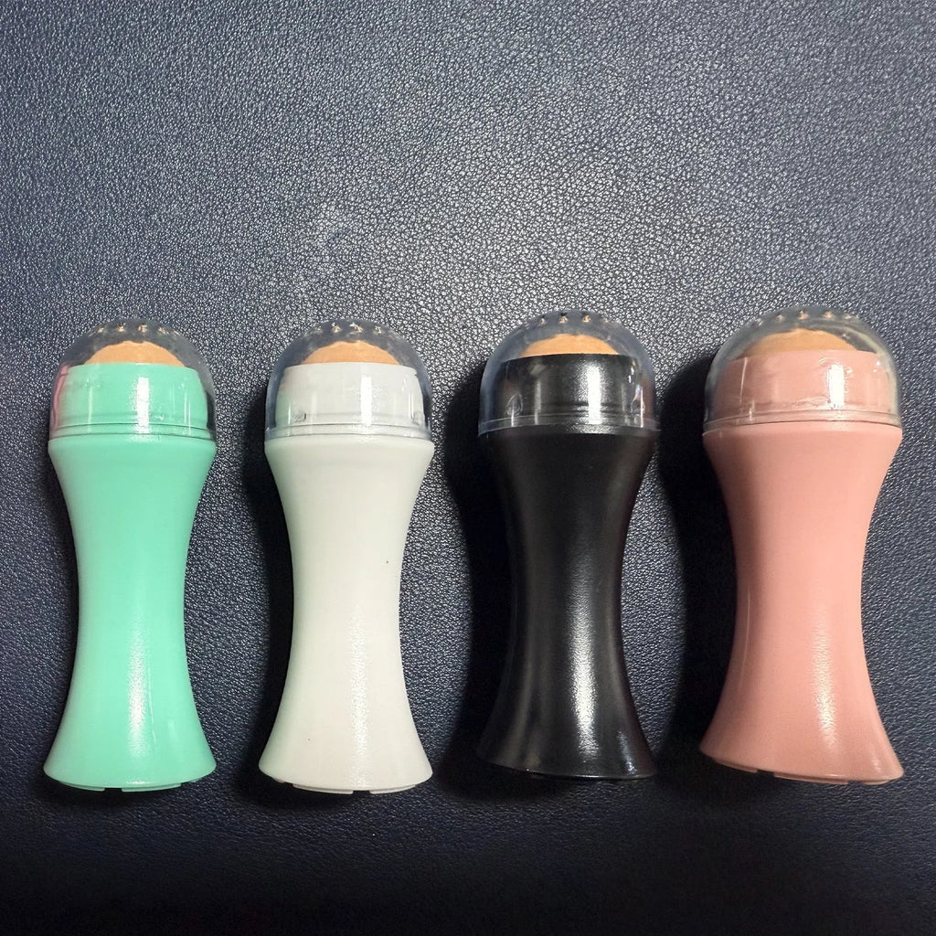 Portable mini volcanic stone roller for oily skin control in black, green, pink, or white