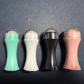 Portable mini volcanic stone roller for oily skin control in black, green, pink, or white