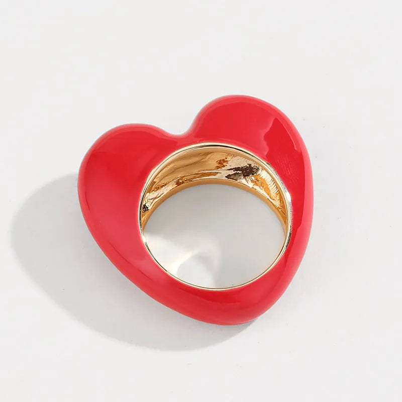 Heart shape three-dimensional enamel ring showing raised design with coloured finish options
