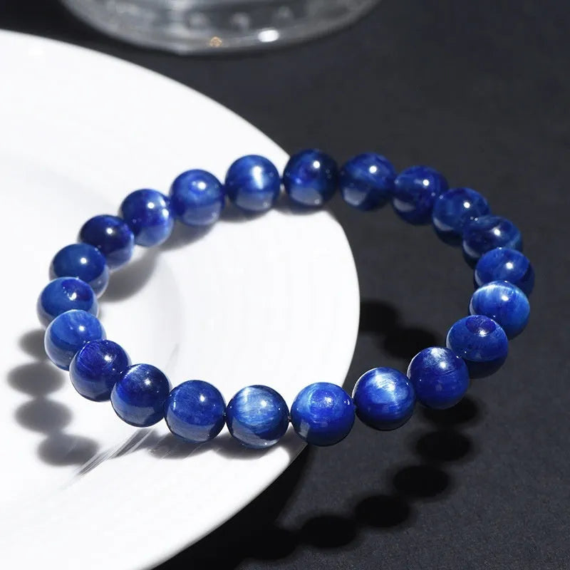 Natural blue crystal ball bracelet with geometric design and Ruyi pattern on wrist