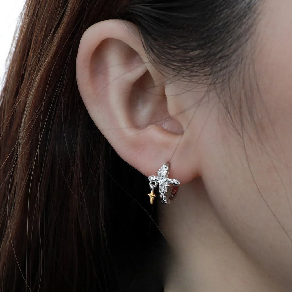 925 sterling silver cross earrings with white gold colour finish and geometric round element design.