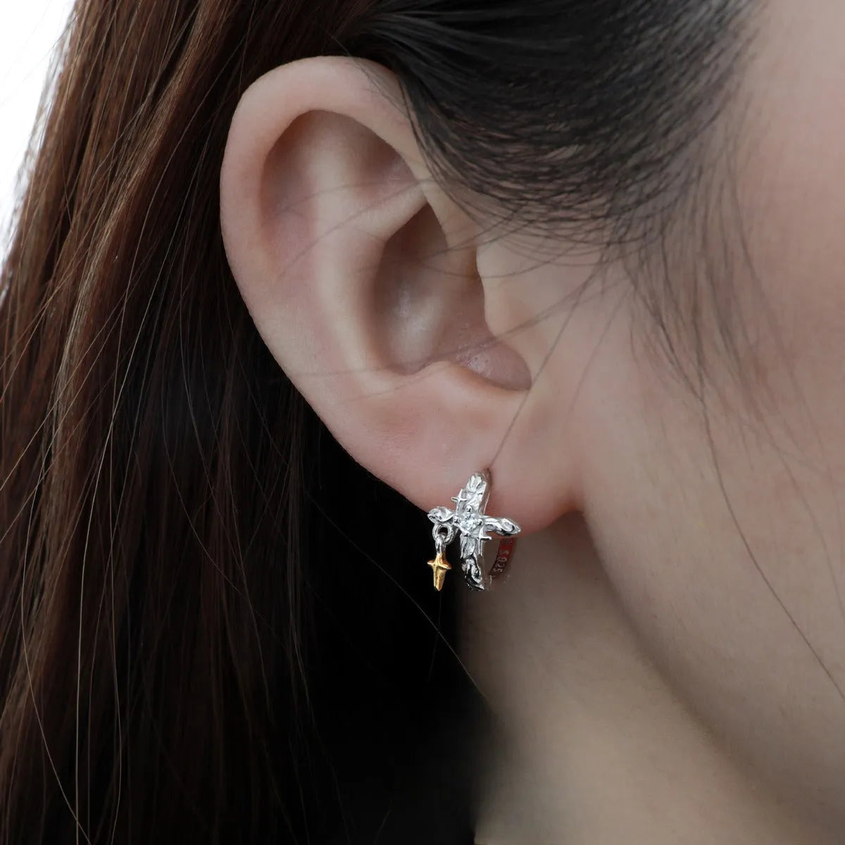 925 sterling silver cross earrings with white gold colour finish and geometric round element design.