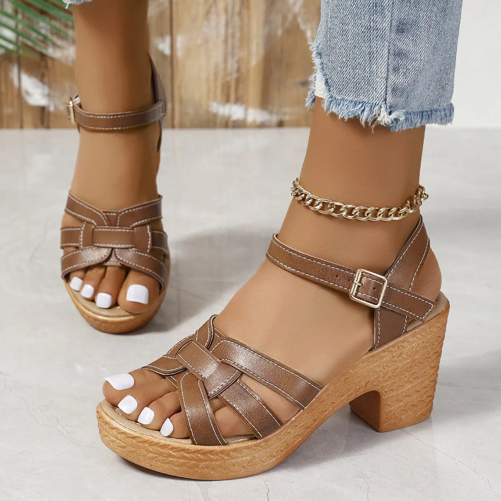 Plus size black women's peep toe sandals with chunky heel and ankle buckle strap.