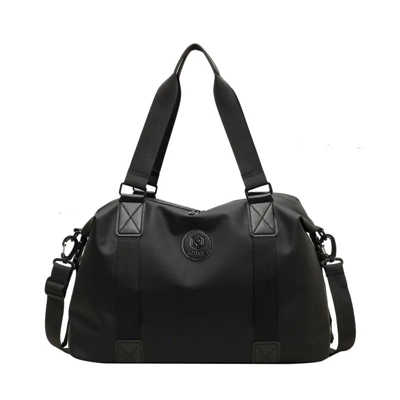 Large black travel rucksack made from Oxford cloth with breathable back padding and multiple compartments.