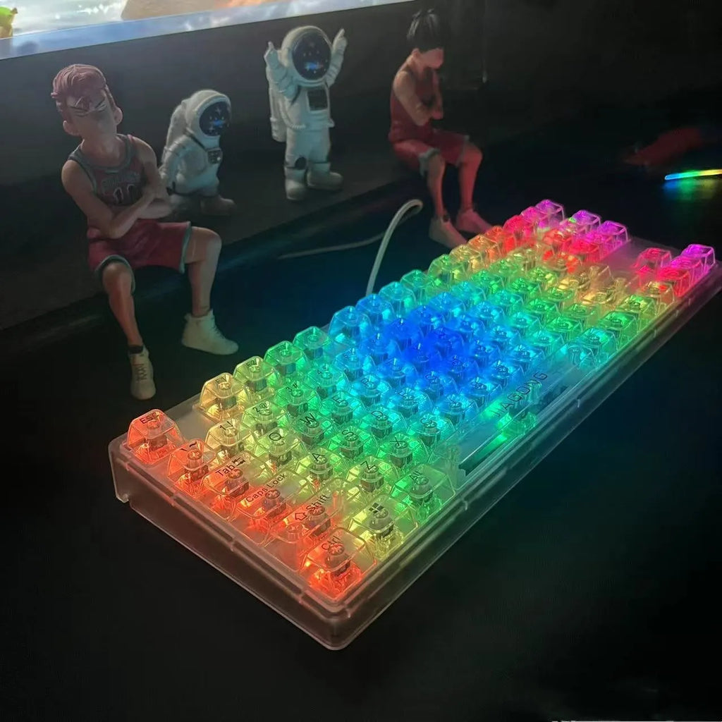 132 transparent plastic key caps arranged for a full-size keyboard layout