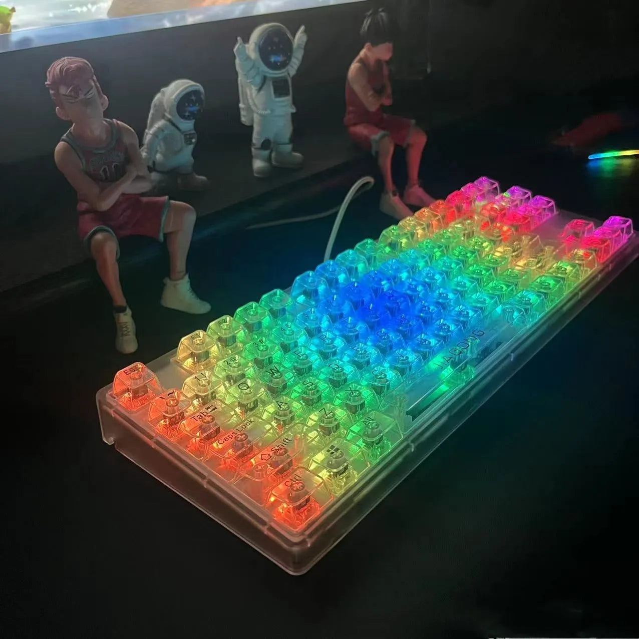 132 transparent plastic key caps arranged for a full-size keyboard layout
