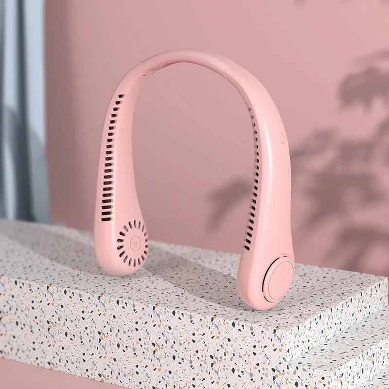 Blue USB rechargeable bladeless neck fan being worn, showing its lightweight design and adjustable controls.