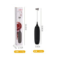Black and white handheld electric milk frother with whisk attachment for coffee and beverage preparation