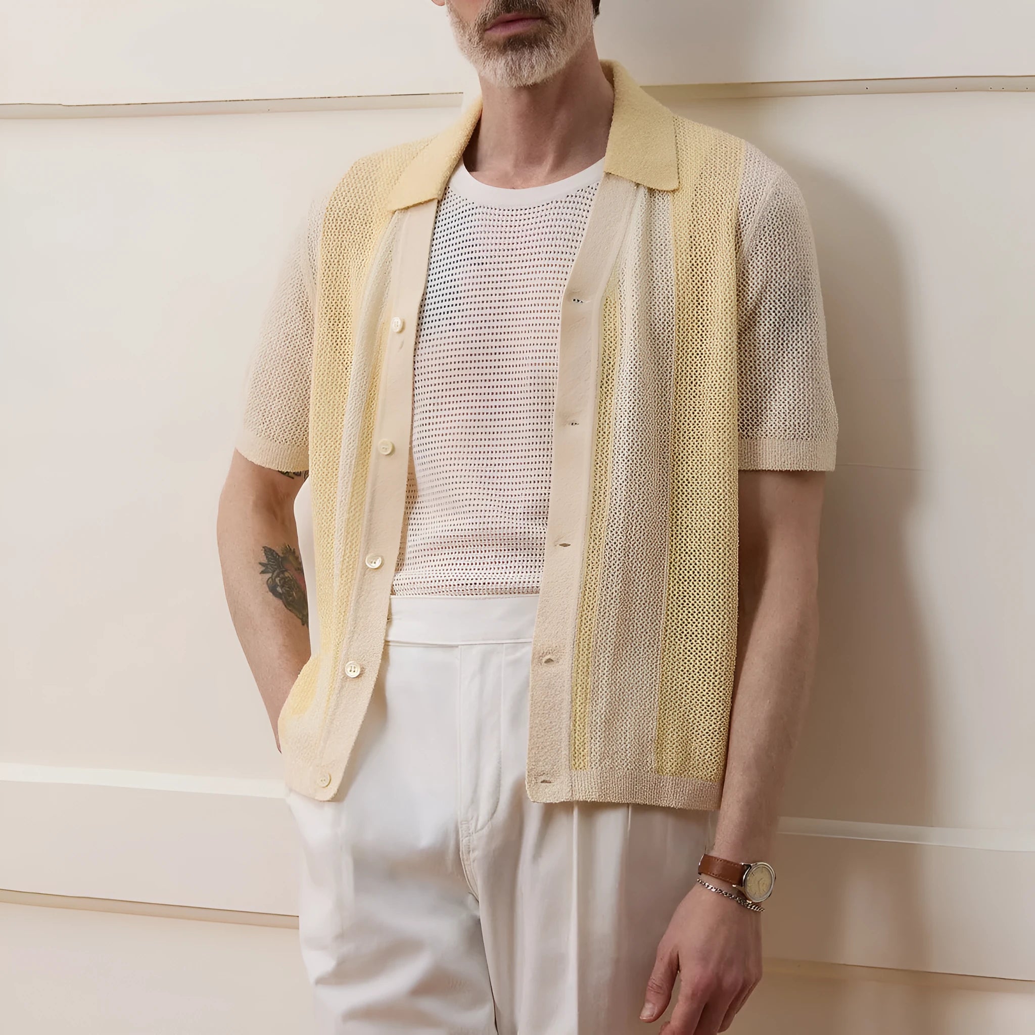 Yellow asymmetrical Tencel polo shirt with hollow-out detailing and short sleeves