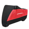 Black polyester motorcycle cover shown fitted on a bike, demonstrating rain and sun protection