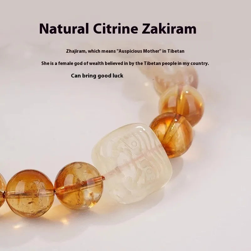 Women's ethnic style bracelet with a carved 10mm citrine crystal geometry bead.