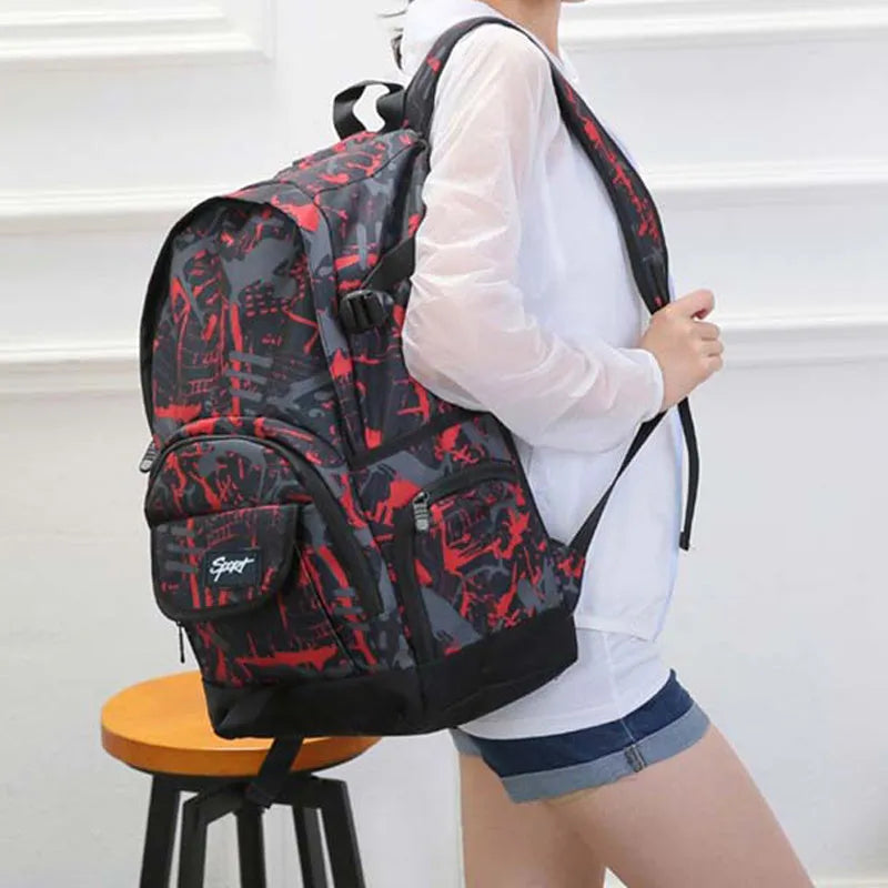 Classic large blue nylon backpack shown from the front, with red colour option available.
