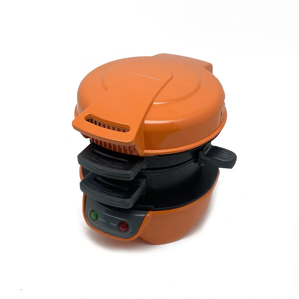 Bright red household breakfast sandwich maker with egg cooker ring and waffle plates on a kitchen counter.