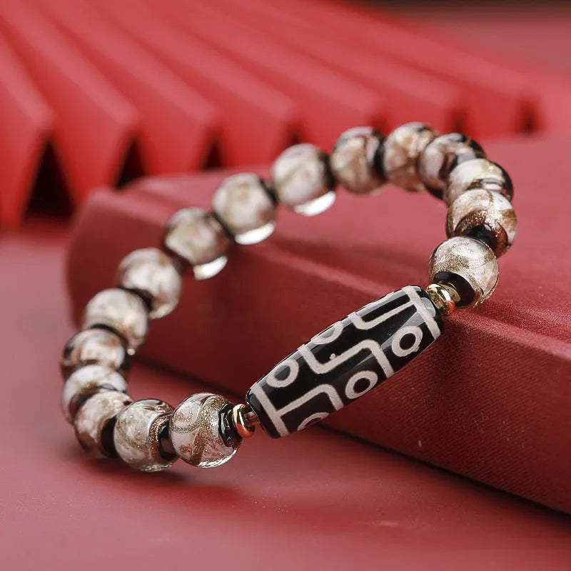 Handmade Chinese-style coloured glaze bracelet with five-colour snake lucky beads in auspicious patterns.