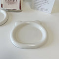 White ceramic ins-style plate with doodle design, shown in bear and round patterns in two sizes.