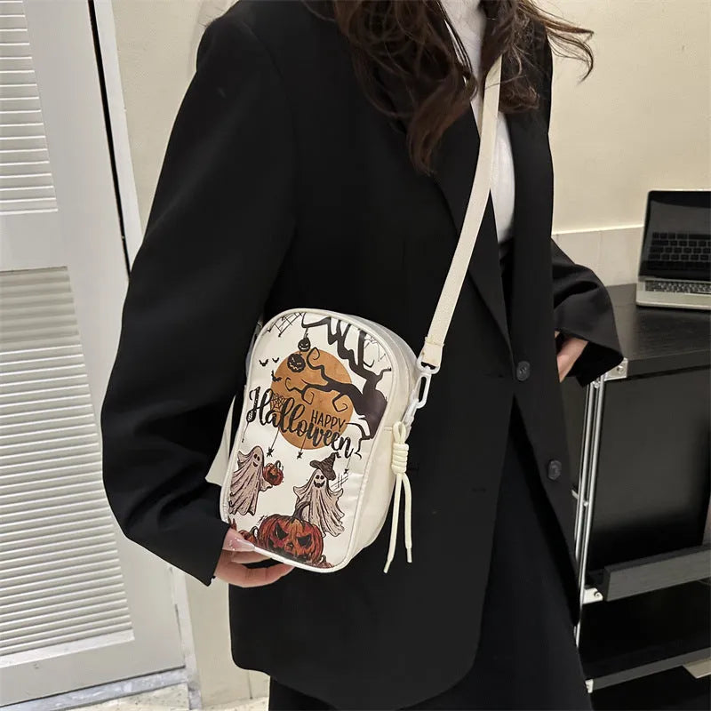 Halloween graffiti crossbody phone bag with pumpkin ghost bat print in medium size