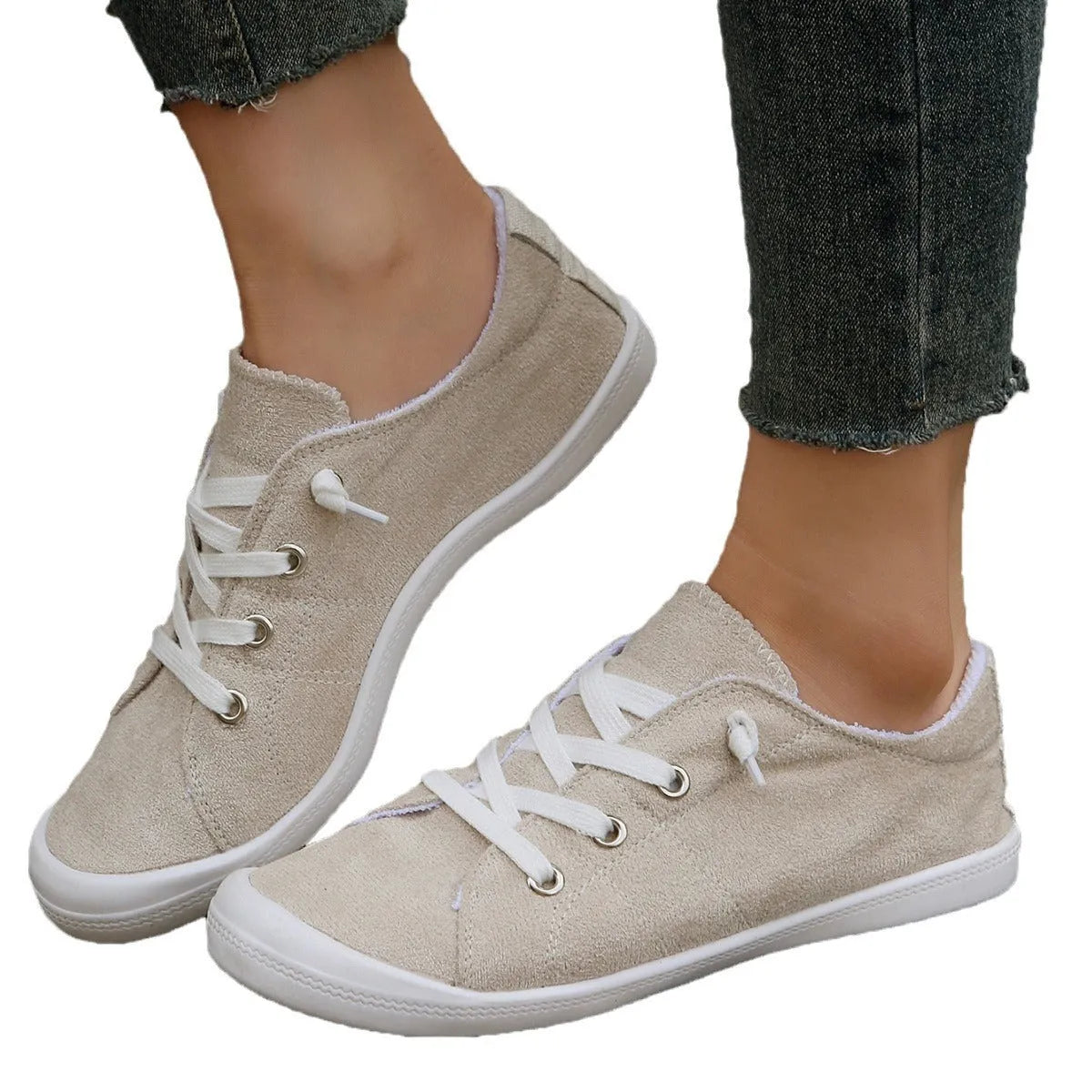 Women's creamy white low-top fabric casual sneaker on a wear-resistant rubber sole