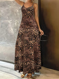 Dark brown leopard print sleeveless dress with round neck and sling straps, made from milk silk polyester fabric.