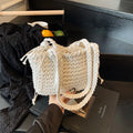 Knitted bucket shoulder bag in beige with external sandwich pocket and sewing thread detail for women