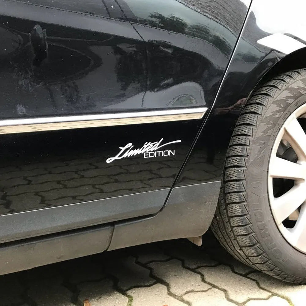 English reflective plastic bumper sticker showing British-style lettering in three colour options