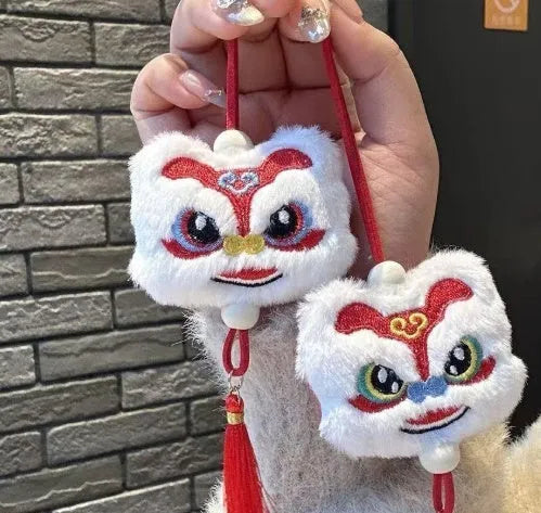 Blue handmade plush lion tassel keychain ornament with star stone detail