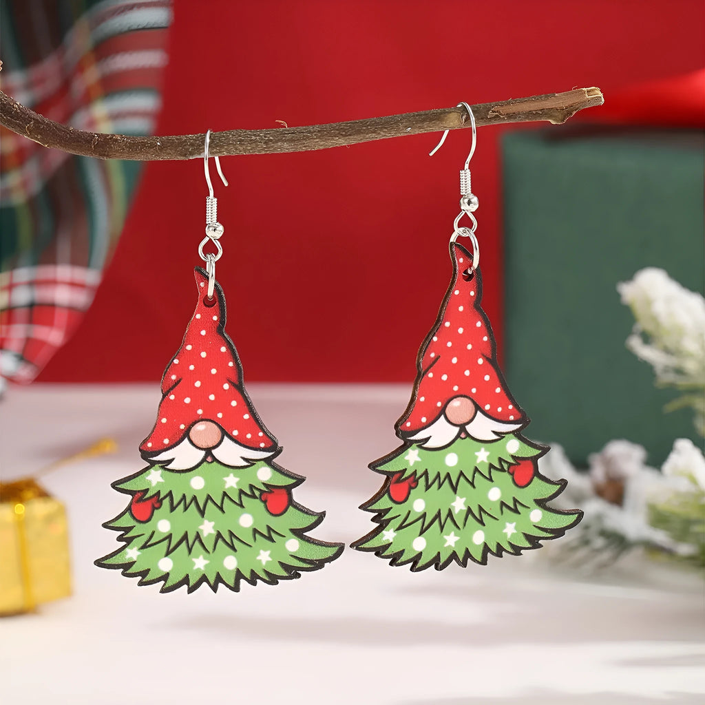 Wooden Christmas earrings with printed tree and snowman designs featuring geometric shapes
