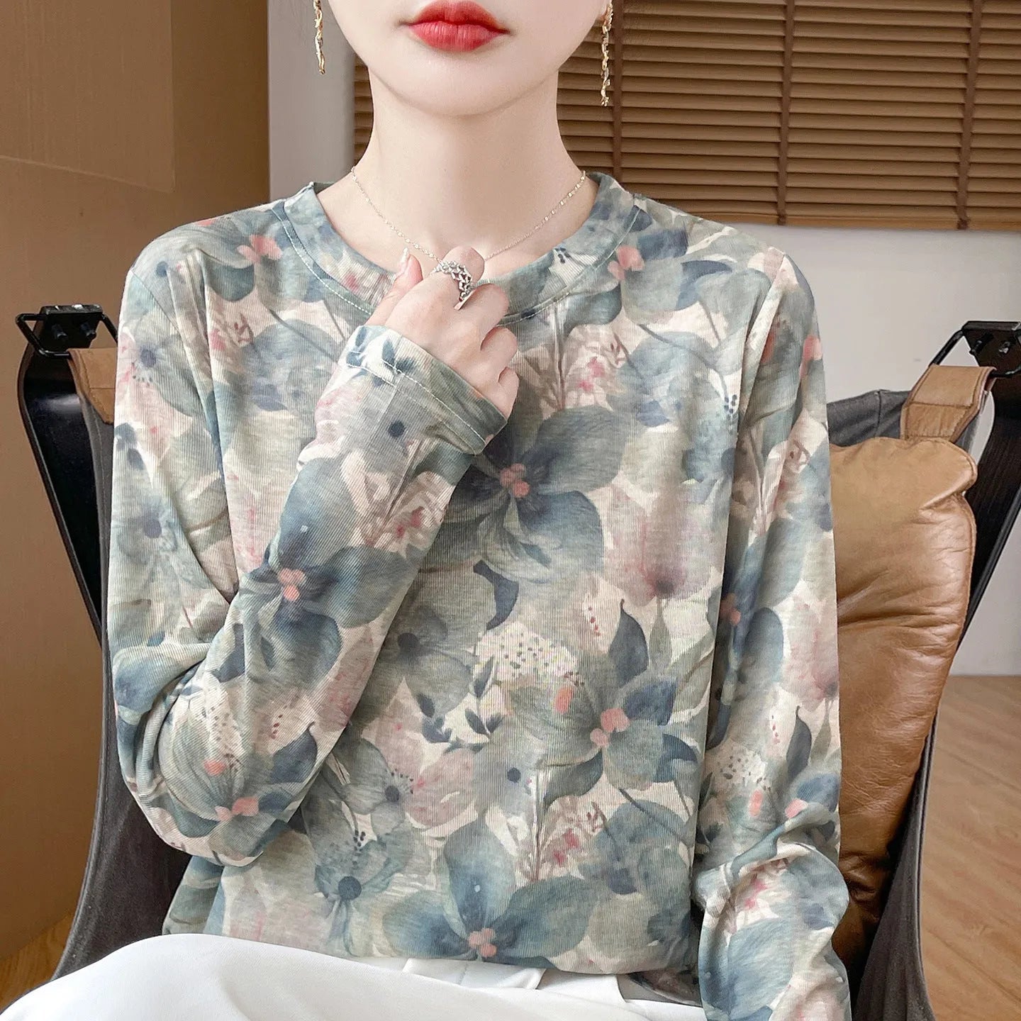 Floral print round neck pullover shirt in Tencel cotton fabric on hanger