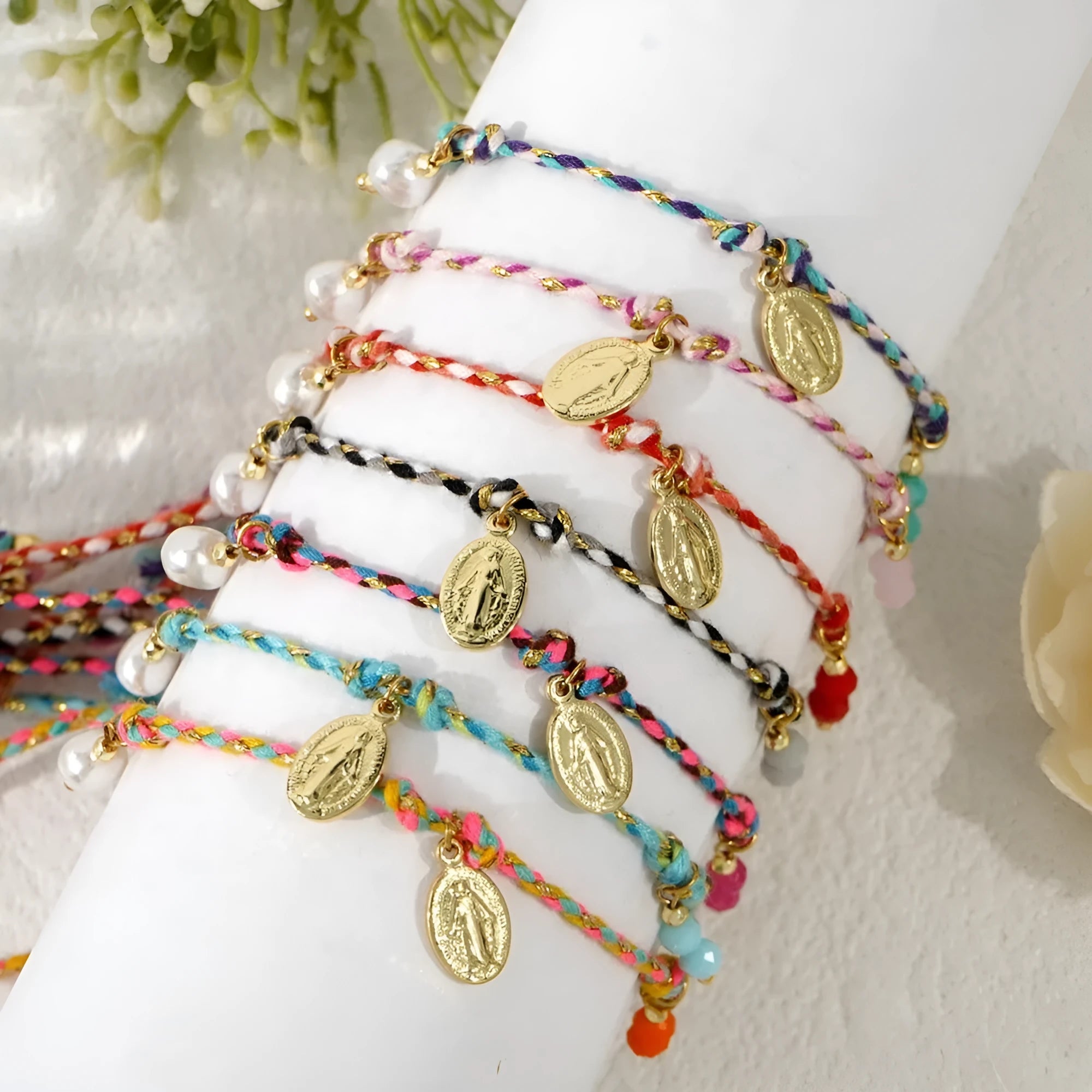 Women's colourful hand-woven ethnic bracelet with braided rope construction and carrying strap tag design