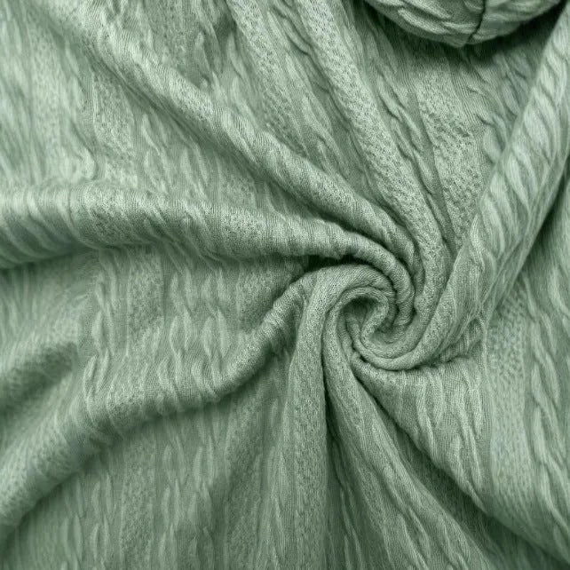 Green hooded zip-front sweatshirt coat on a hanger, showing loose fit and casual style.