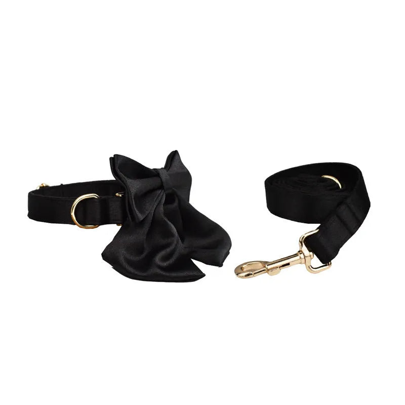Cloth dog collar and leash set with matching vest and bow tie in four adjustable sizes