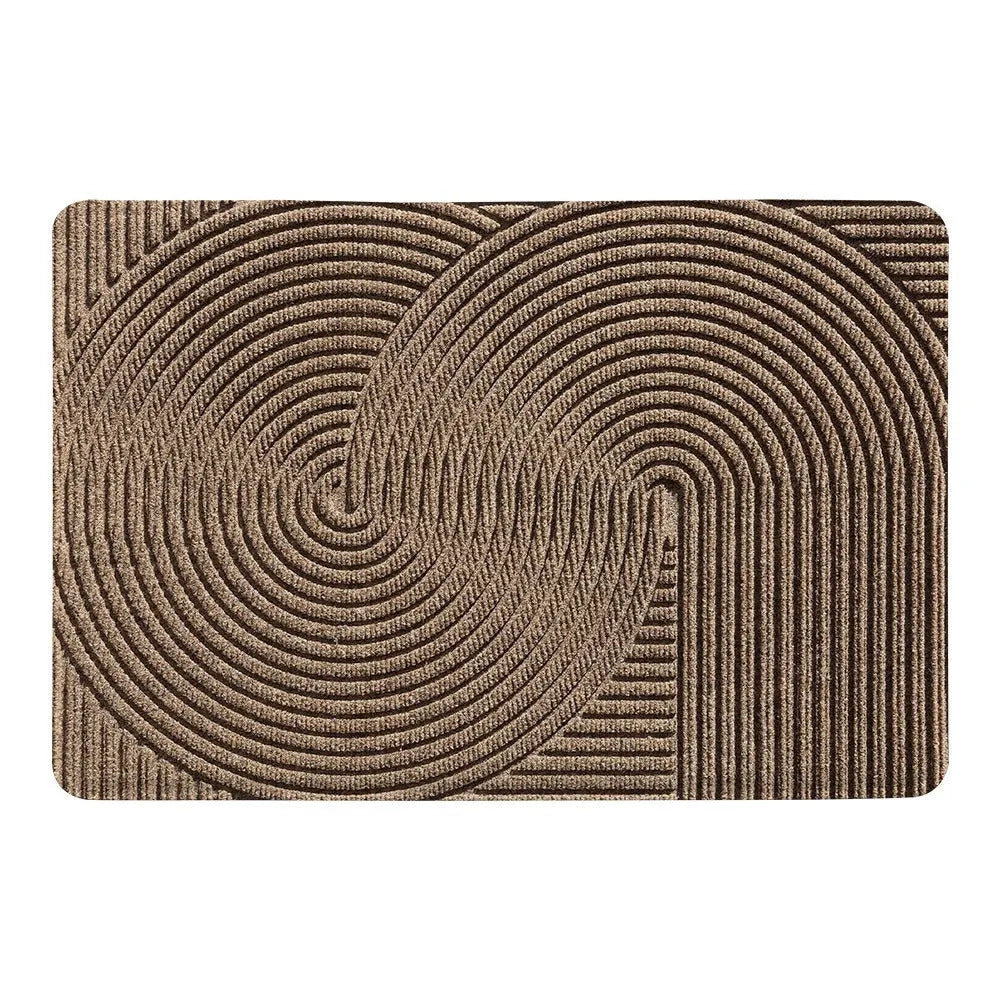 Green cartoon anime alien shaped silk ring entrance carpet measuring 60x90cm on a floor.