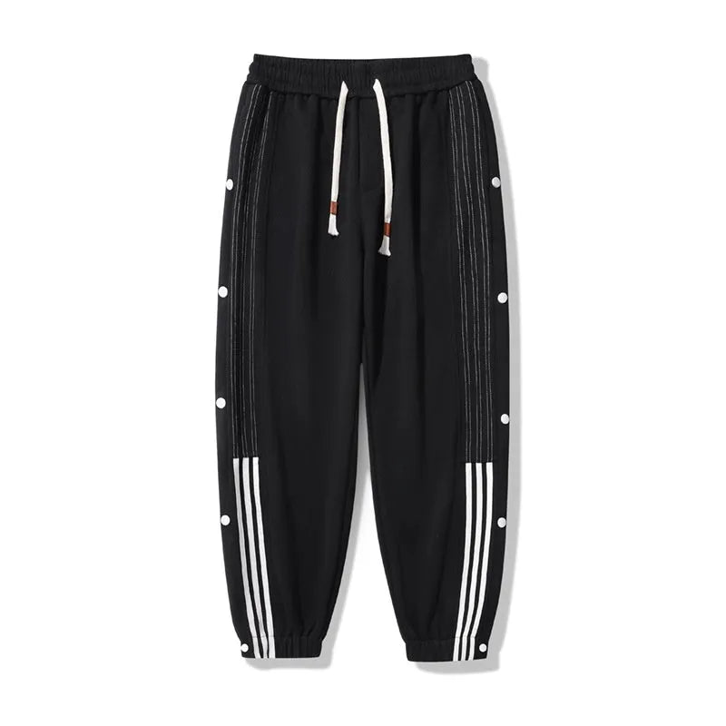 Men's loose fit cotton blend sweatpants with ankle ties and drawstring waistband in black colour