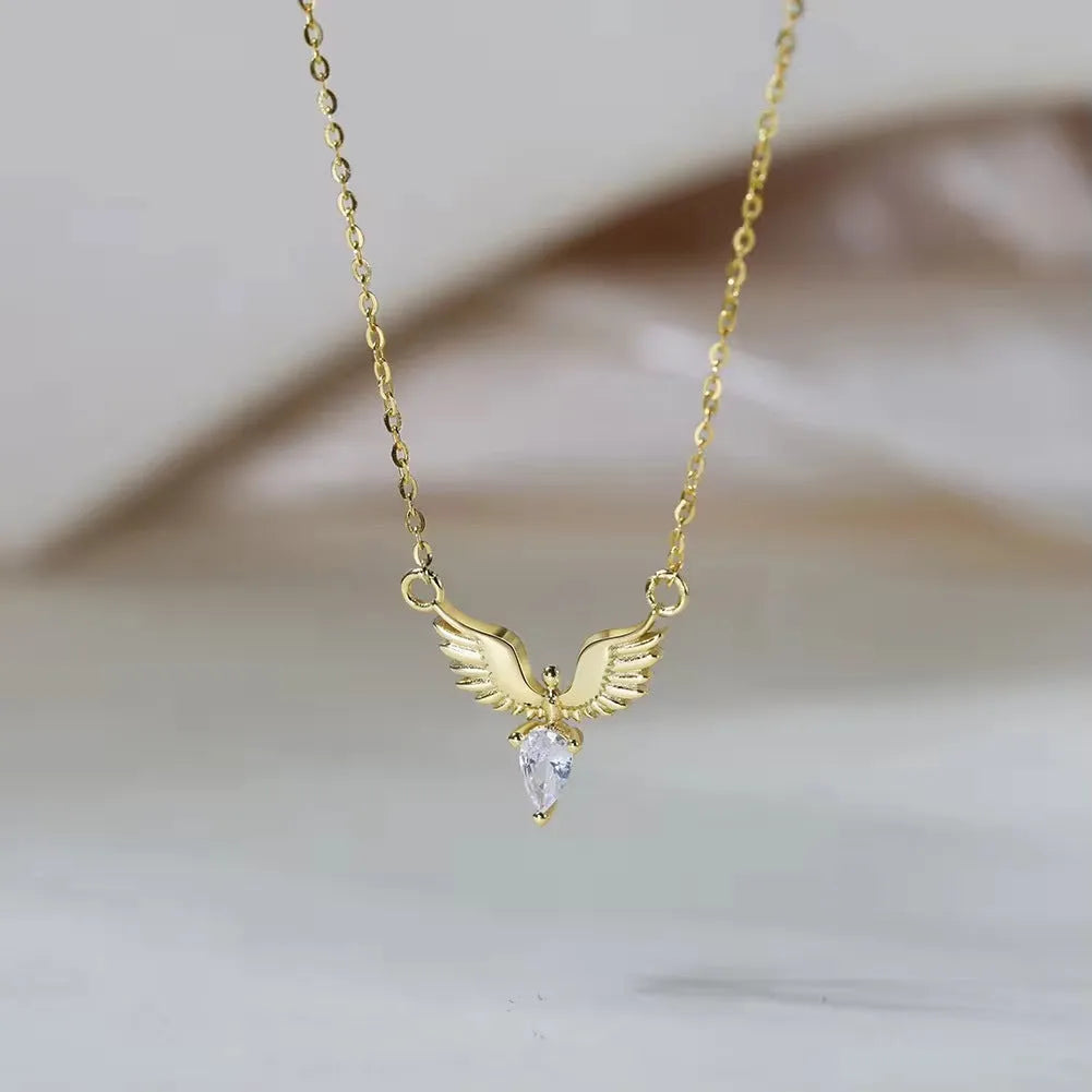 Women's 925 silver eagle pendant necklace on an adjustable O-ring chain in a white gold or yellow gold electroplated finish.