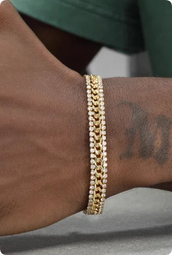 Gold tennis bracelet with titanium steel construction and artificial gemstone inlay on wrist