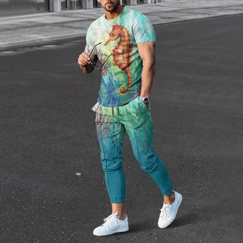Man wearing a thin, short-sleeved printed pullover and matching trousers from a lightweight sport suit set.