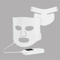 Black and gold LED phototherapy face mask with controller on a white background.
