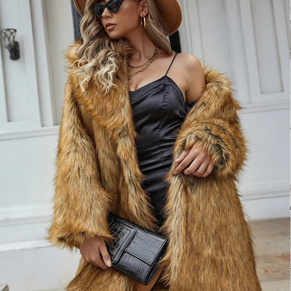 Yellow women's loose-fit faux fur coat with regular sleeves, shown on a model.