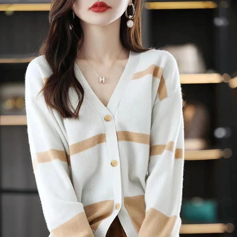Women's slim fit V-neck cardigan with 3D striped pattern and buttons in four colour options.